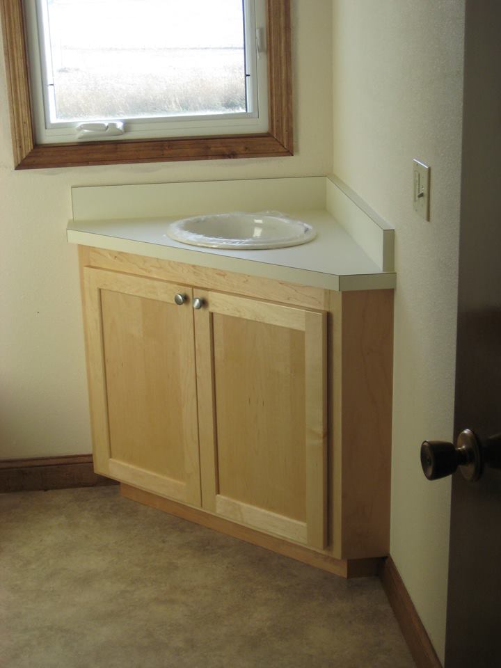 Maple vanity with a clear finish.