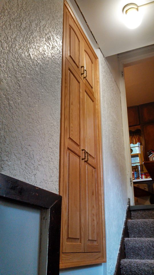 Pantry cabinet located next to the kitchen